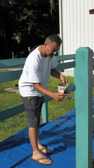 Painting the bridge railing