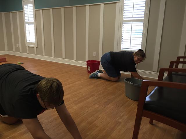 Mom and son scrubbing